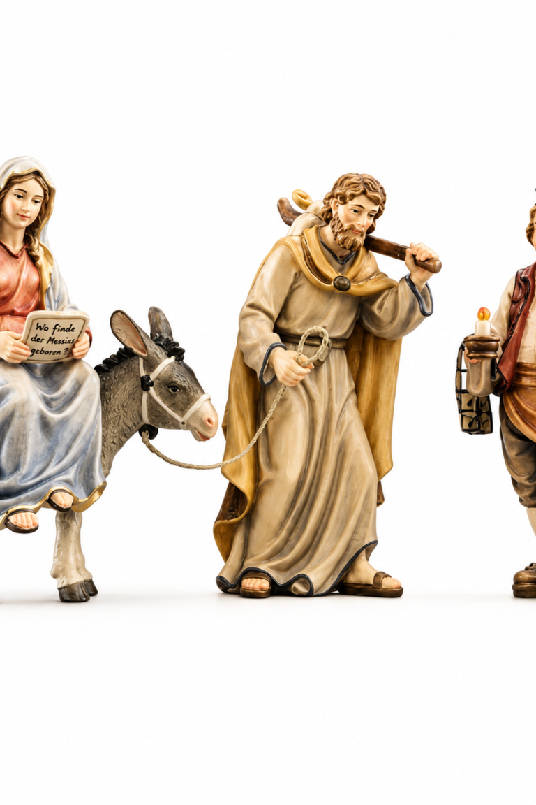 Herbergsuche mit Maria auf dem Esel, Josef und Wirt als holzgeschnitzte Krippenfiguren für Weihnachtskrippen.